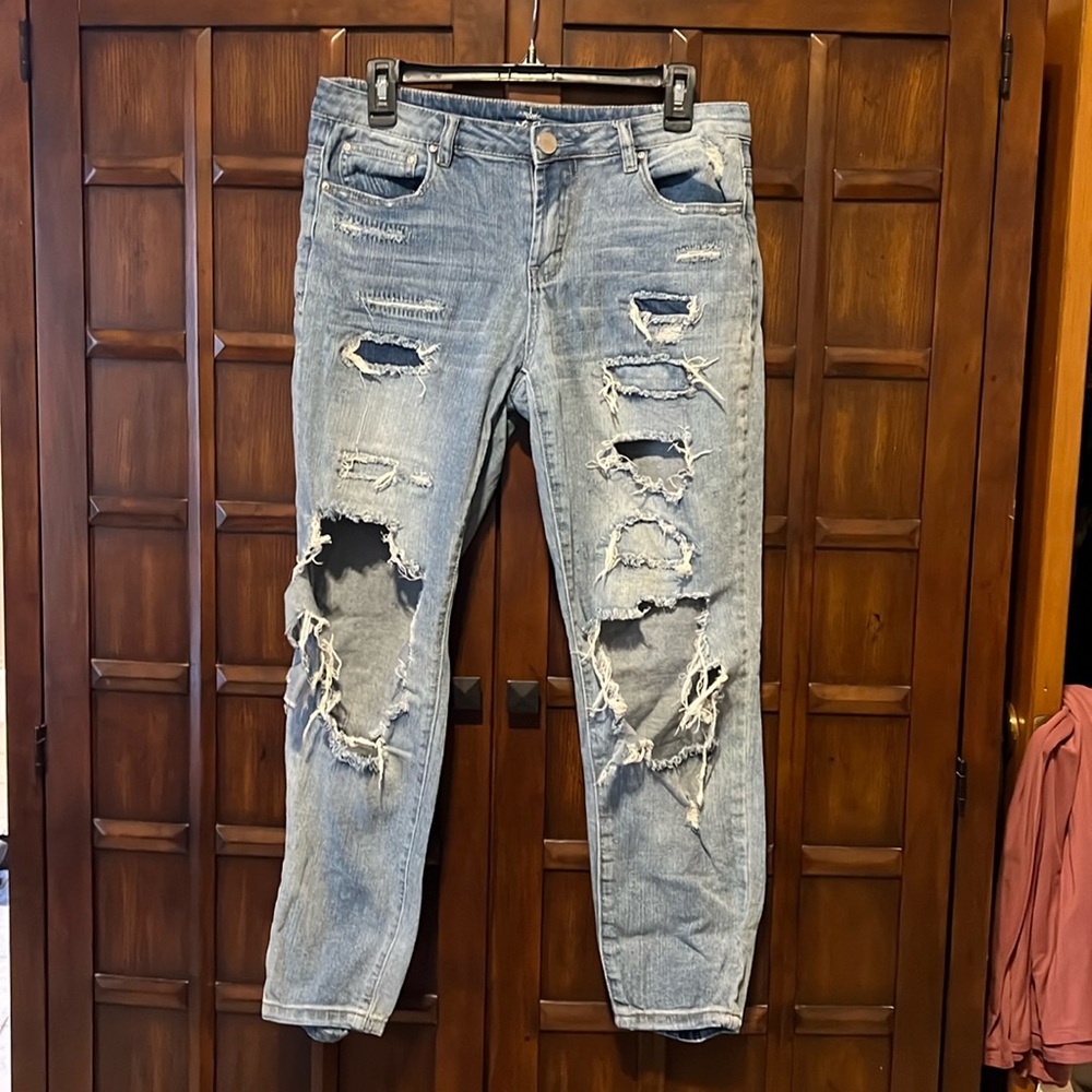 Almost Famous distressed jeans.